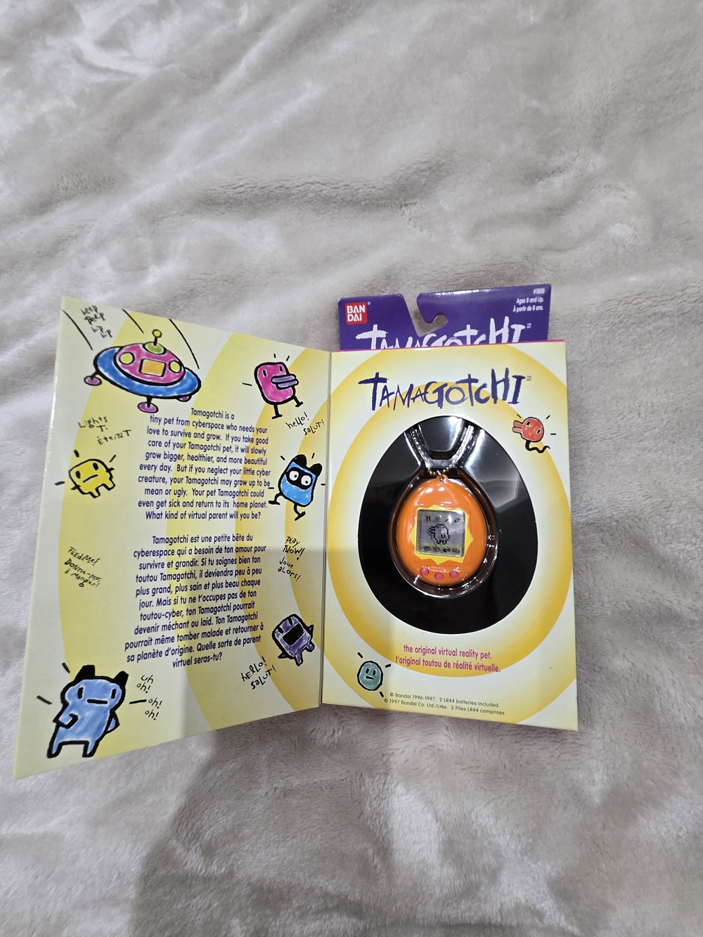 Tamagotchi Orange Virtual Pet - Bandai
